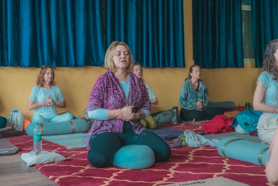Meditation cushions arranged for a breathwork session