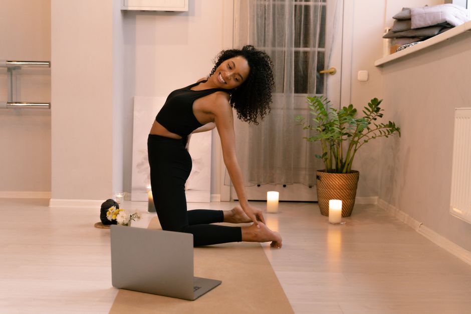 A dimly lit studio set up for a restorative class